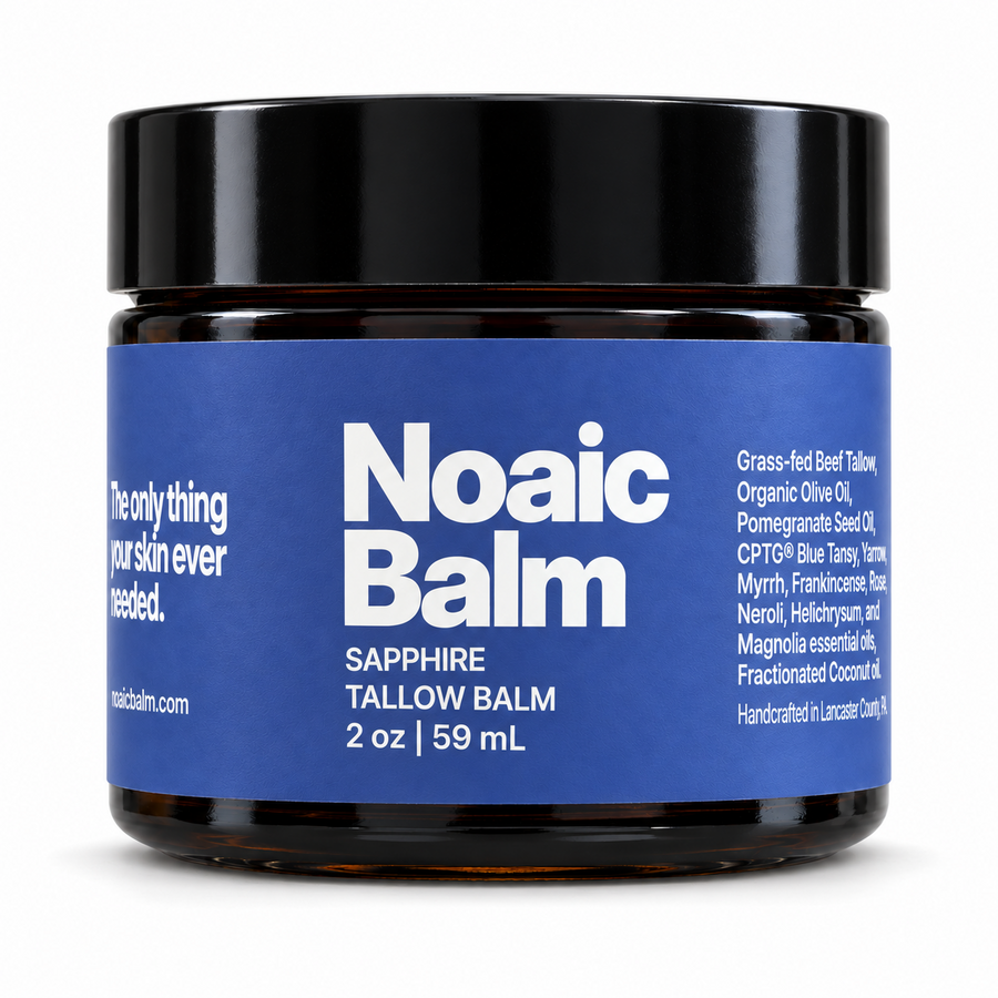 Noaic Balm Sapphire tallow balm, 2 oz jar with the new label on a white background.